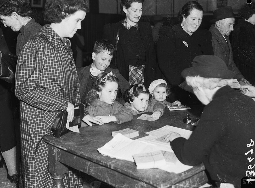 Family lines up for ration books