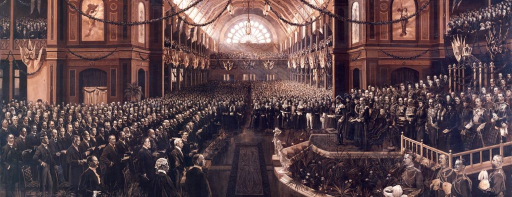 the opening of commonwealth parliament charles nuttall painting of a decorative wide indoor space filled with people looking towards a raised platform. The vast majority of people depicted are white males.