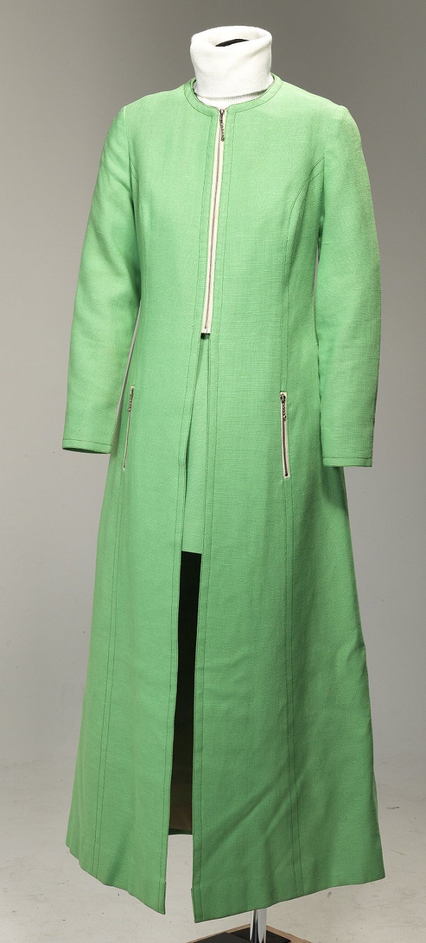 Lime green linen long-sleeved maxi coat with metal zippered front fastening and pocket openings. The coat is lined with lime green polyester.